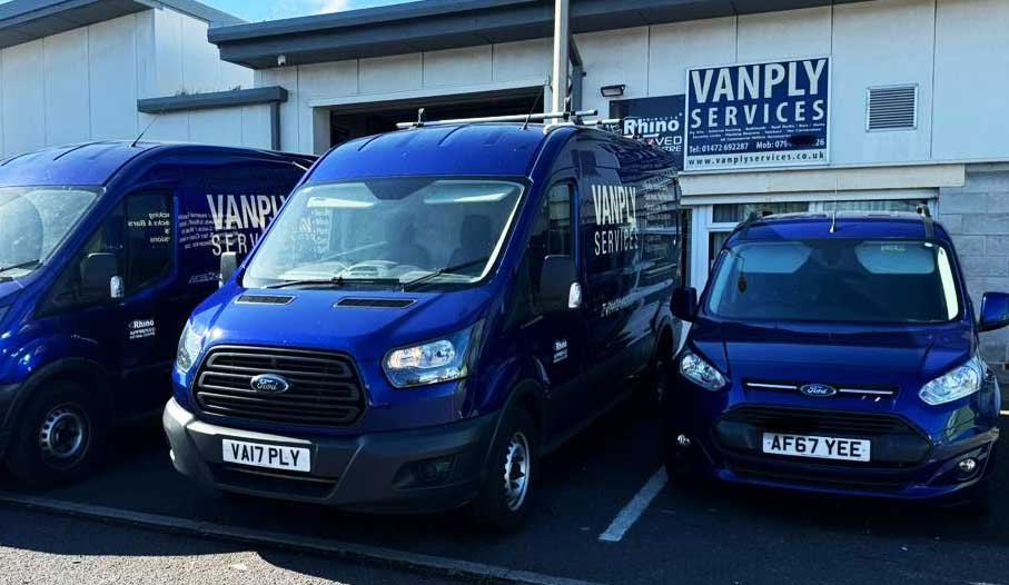 Vanply Services vans outside the workshop